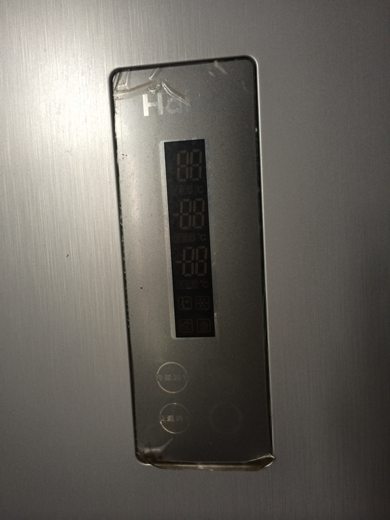 方法一：使用冰箱上的调温按钮